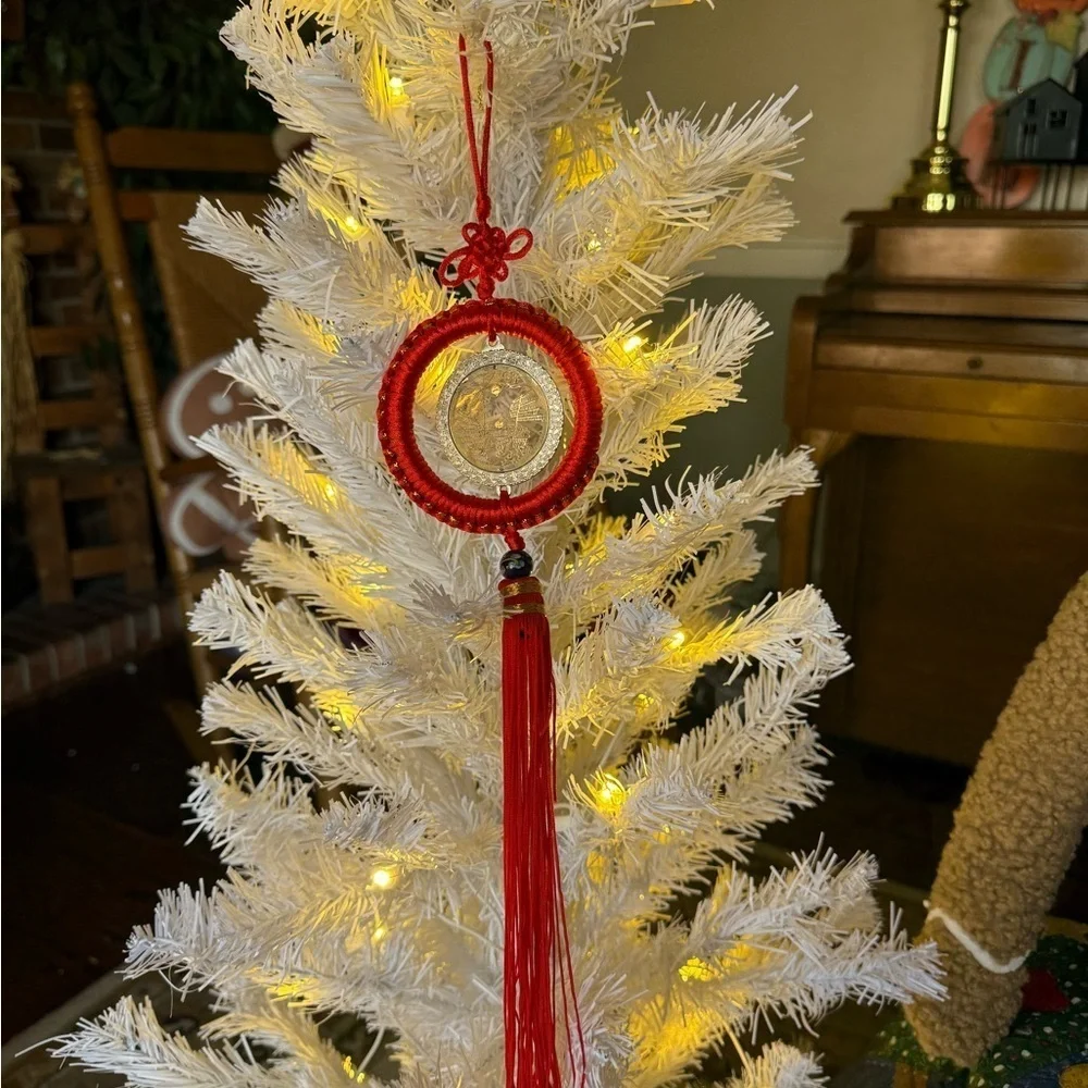 Chinese Feng Shui lucky coin hanging charm with a red knot and tassel Ornament